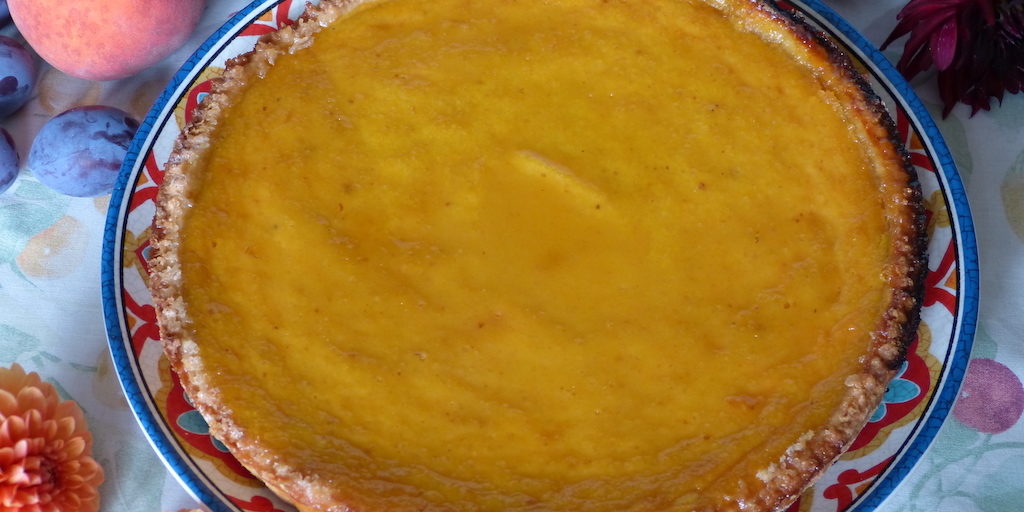 Tarte-melon-les-causeries-culinaires-recette-fait-maison-boutique-saveur-histoire photo-tarte-au-melon-avec-fruits-autour